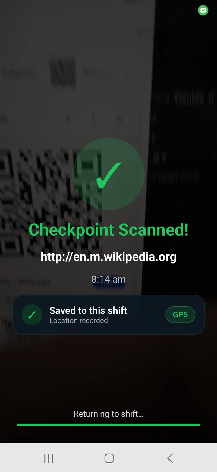 Guard Tour Lite confirming a scanned QR checkpoint with the time and a note that the location was recorded
